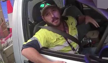 Queensland driver pulled over – after wrestling snake in ute